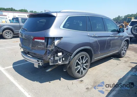 2020 Honda Pilot 2Wd Touring 7 Passenger z USA, uszkodzony, nr VIN 5FNYF5H61LB011831